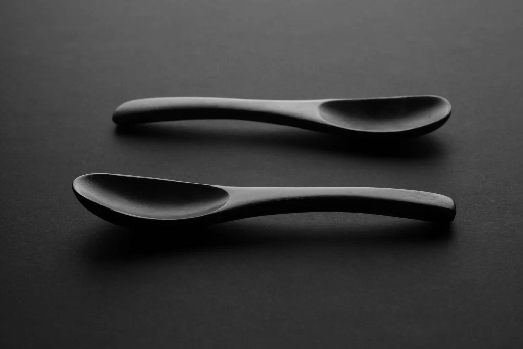2 Black Spoons