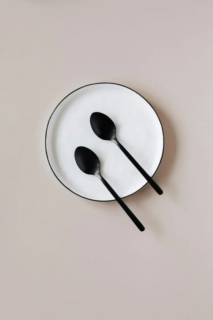 Two Black Table Spoons